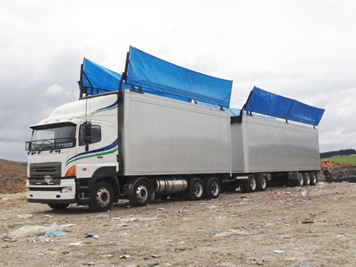 Double-Flip™ Waste Transport Cover Solution